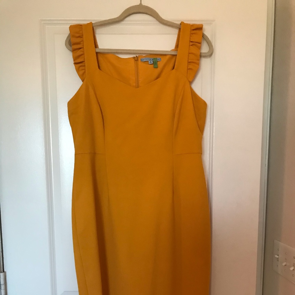 Worn once. Small stains on front - see photo.
